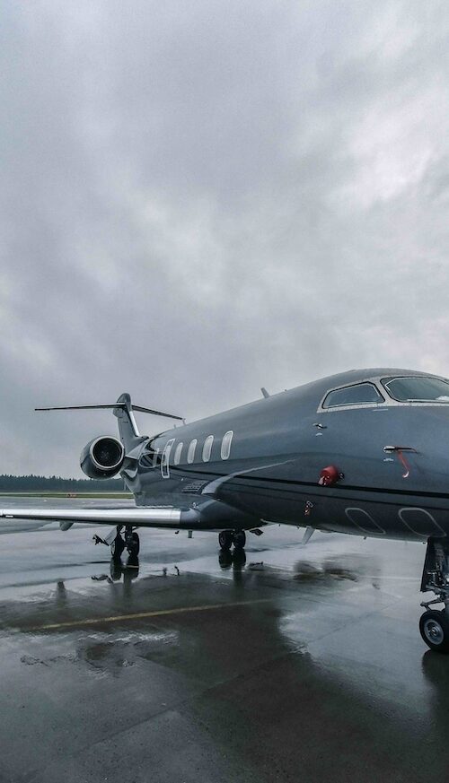 CICNDT Joins NSBA. A Business jet parked on a wet tarmac under a cloudy sky