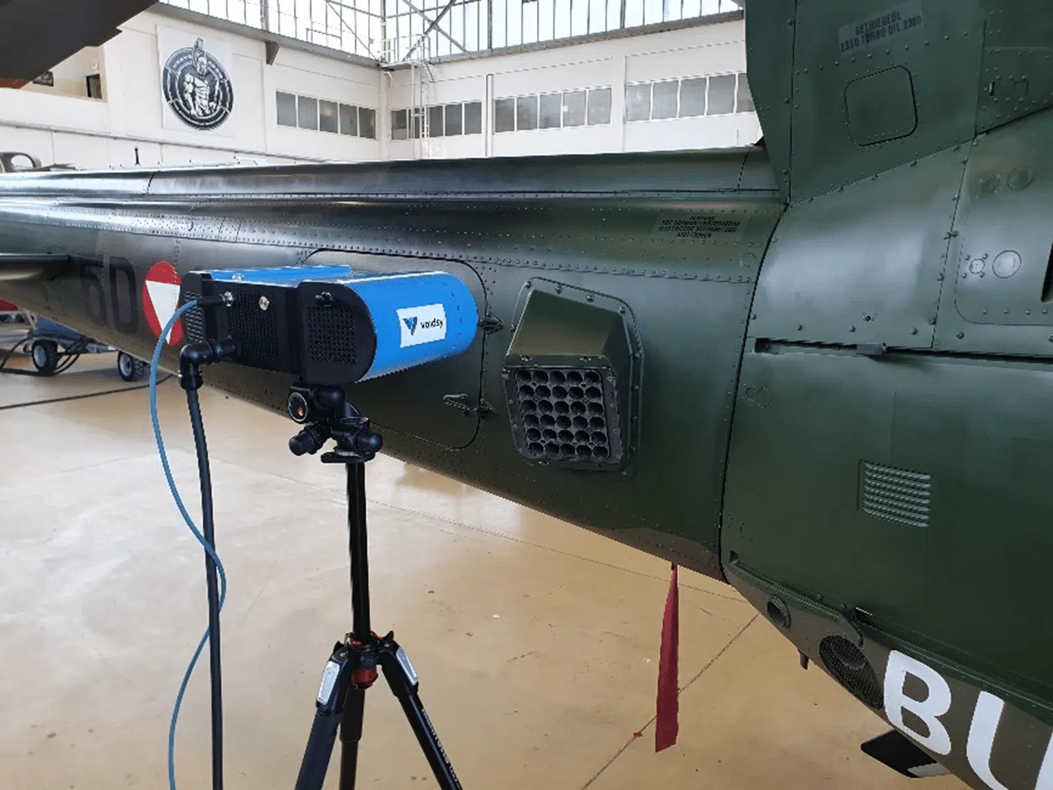 Voidsy's 3D V-ROX Photothermal Tomography device inspecting a helicopter tail boom for composite defects